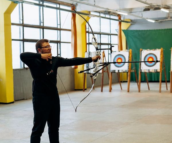 Portrait of a smiling, confident person in workout clothes.